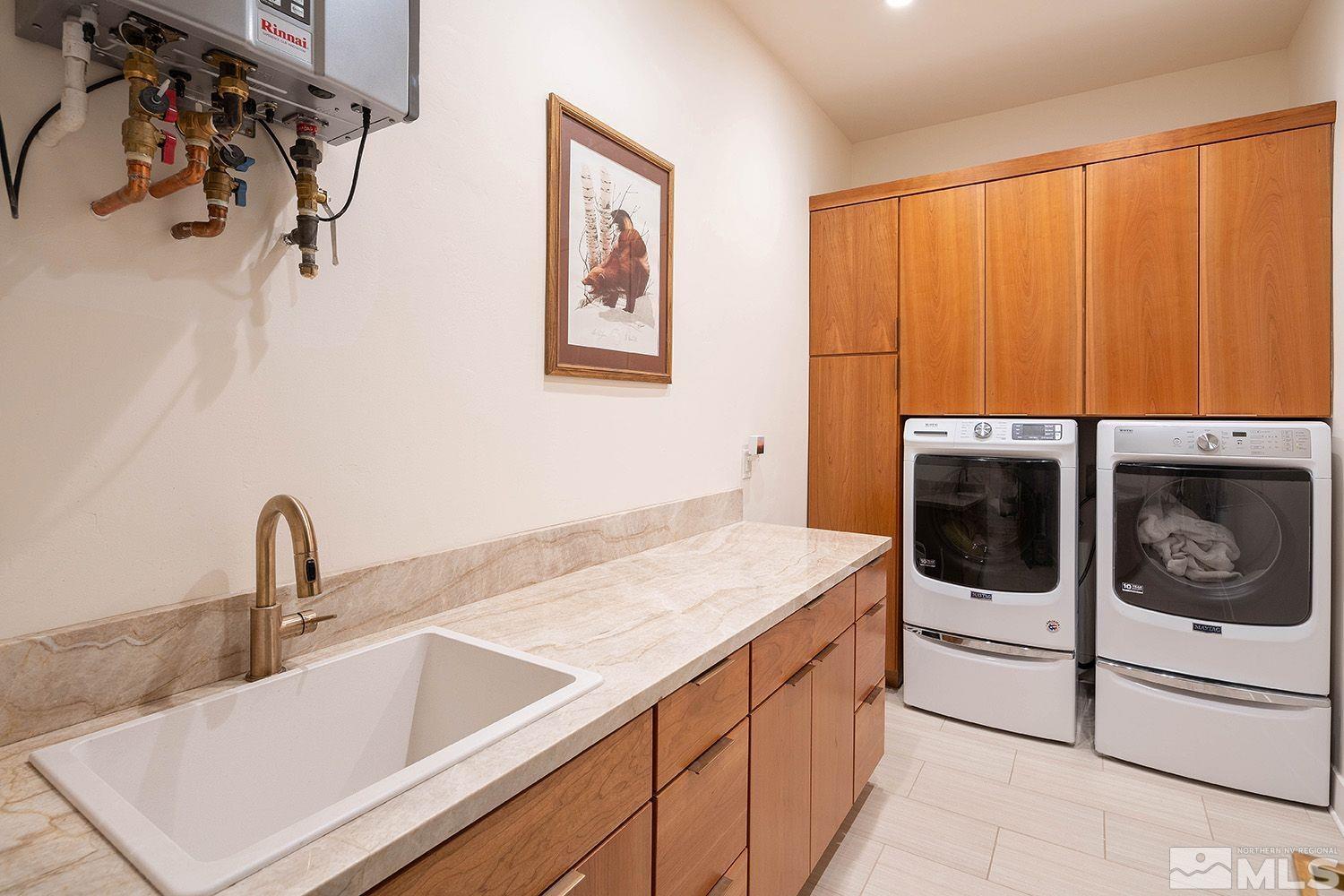 21635 Delta Drive Reno, NV 89521 - Photo 19 of 27 a kitchen with a sink and cabinets