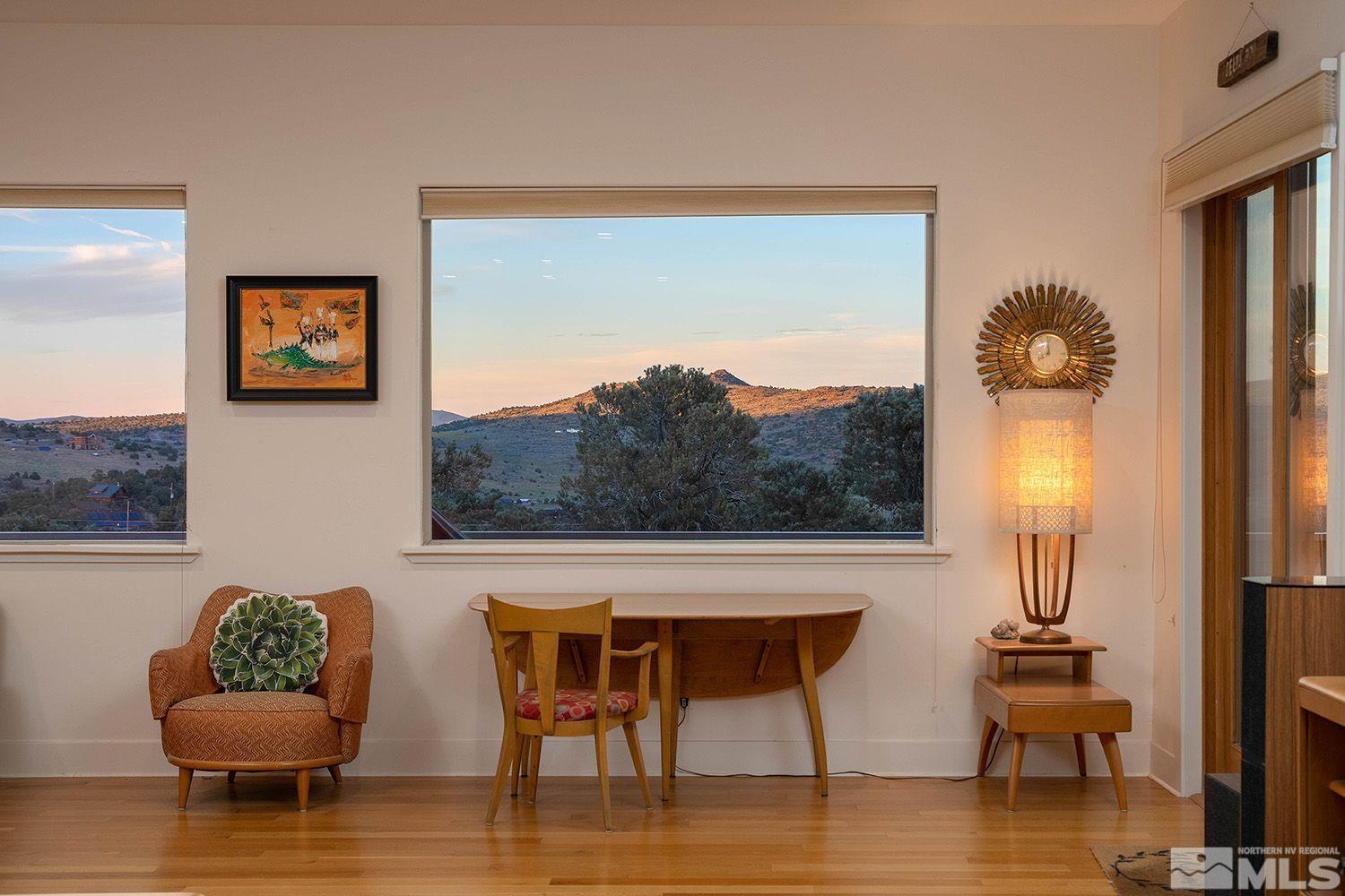 21635 Delta Drive Reno, NV 89521 - Photo 23 of 27 a view of furniture and wooden floor in a room