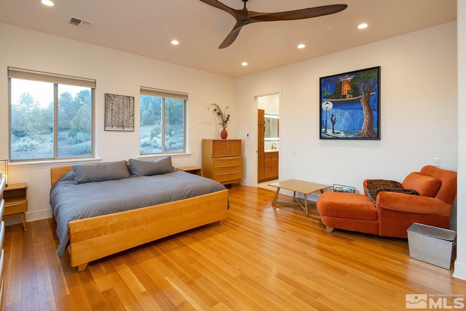 21635 Delta Drive Reno, NV 89521 - Photo 6 of 27 a bedroom with furniture and wooden floor