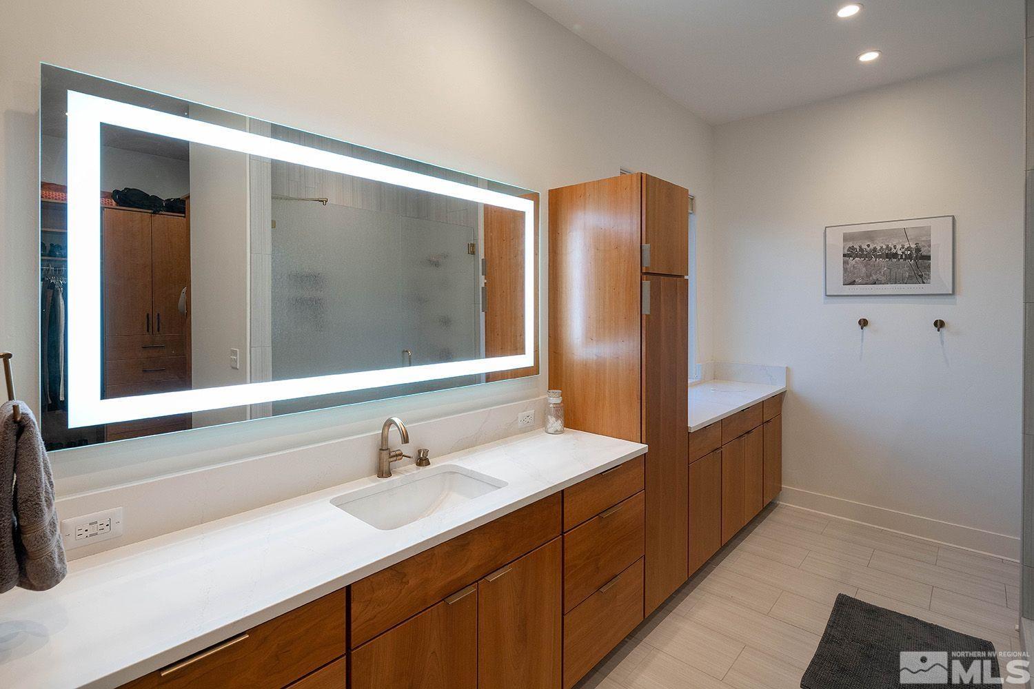 21635 Delta Drive Reno, NV 89521 - Photo 8 of 27 a bathroom with a sink and a mirror