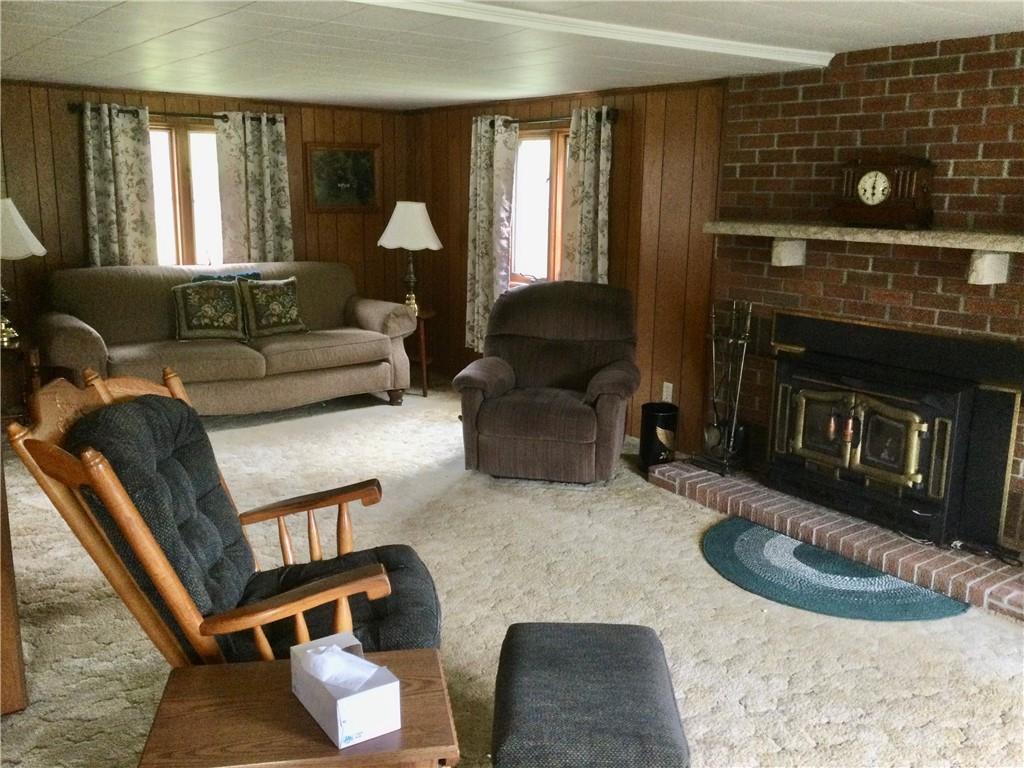 1133 Brush Run Road Washington, PA 15301 - Photo 5 of 19 a living room with furniture and a fireplace