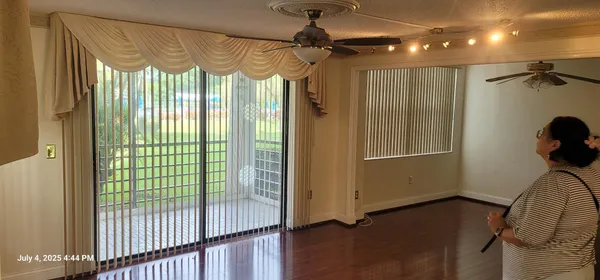 a view of a room with windows