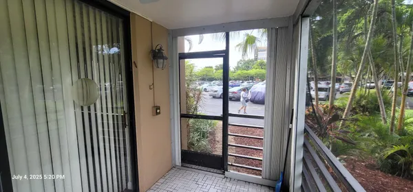 a view of a balcony with an outdoor space