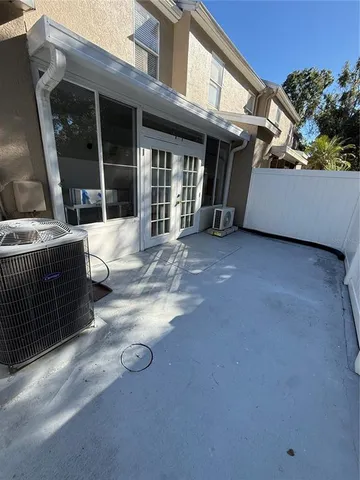 a view of balcony with wooden floor