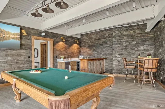 a view of a chairs and table in patio