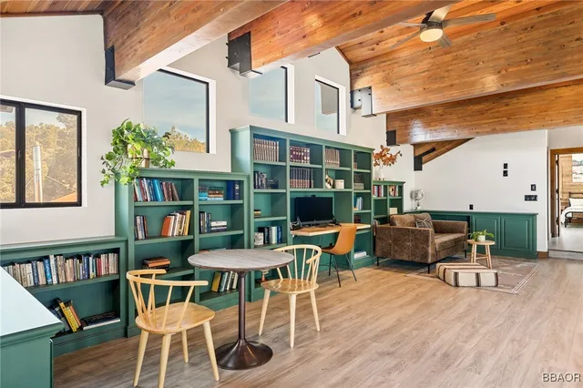 a view of a patio with a table and chairs