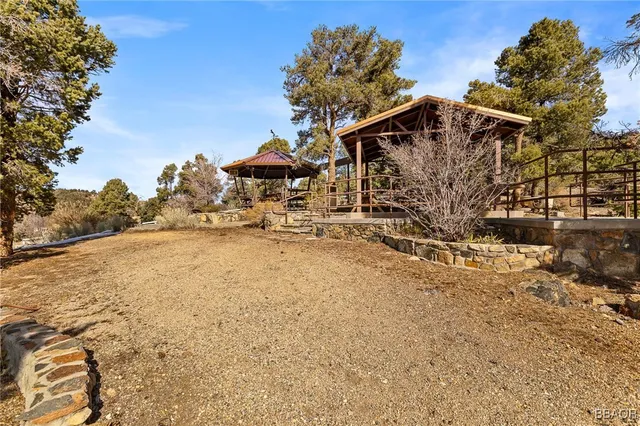 a view of a house with a snow on the road