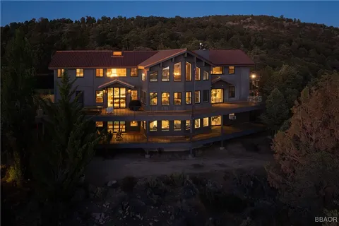 a view of a large with large trees