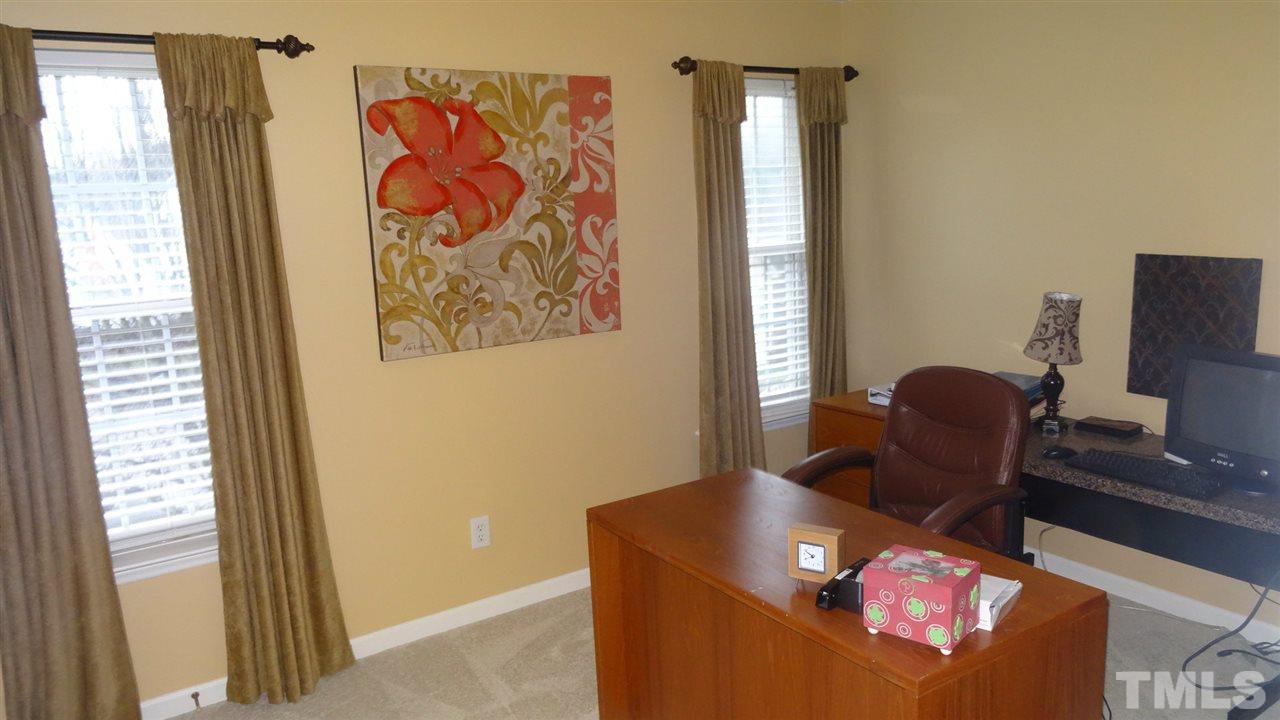 7908 Old Mill Ridge Court Raleigh, NC 27616 - Photo 12 of 17 a living room with furniture and a window