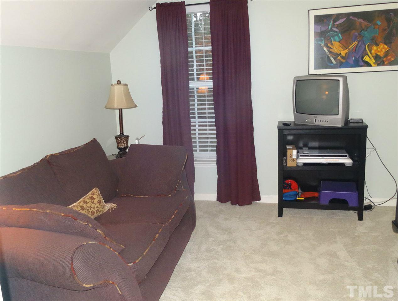 7908 Old Mill Ridge Court Raleigh, NC 27616 - Photo 10 of 17 a living room with furniture