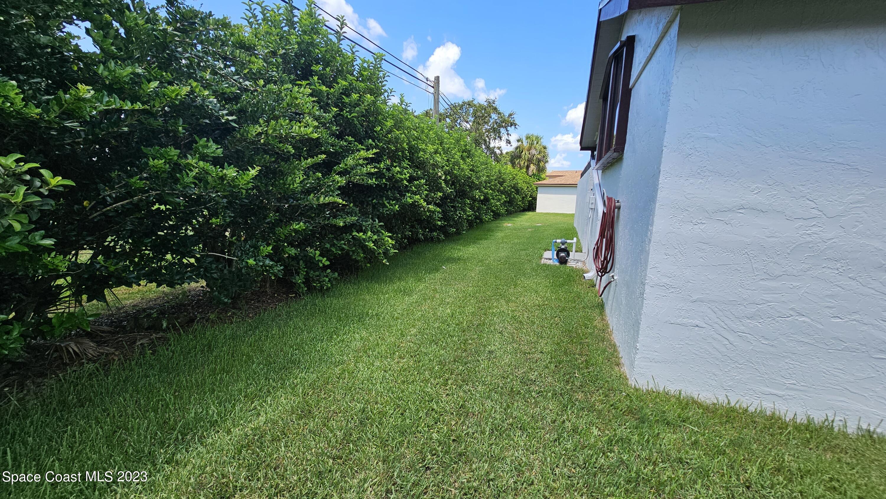 329 Pine Ridge Lane Melbourne, FL 32940 - Photo 25 of 30 back of the house
