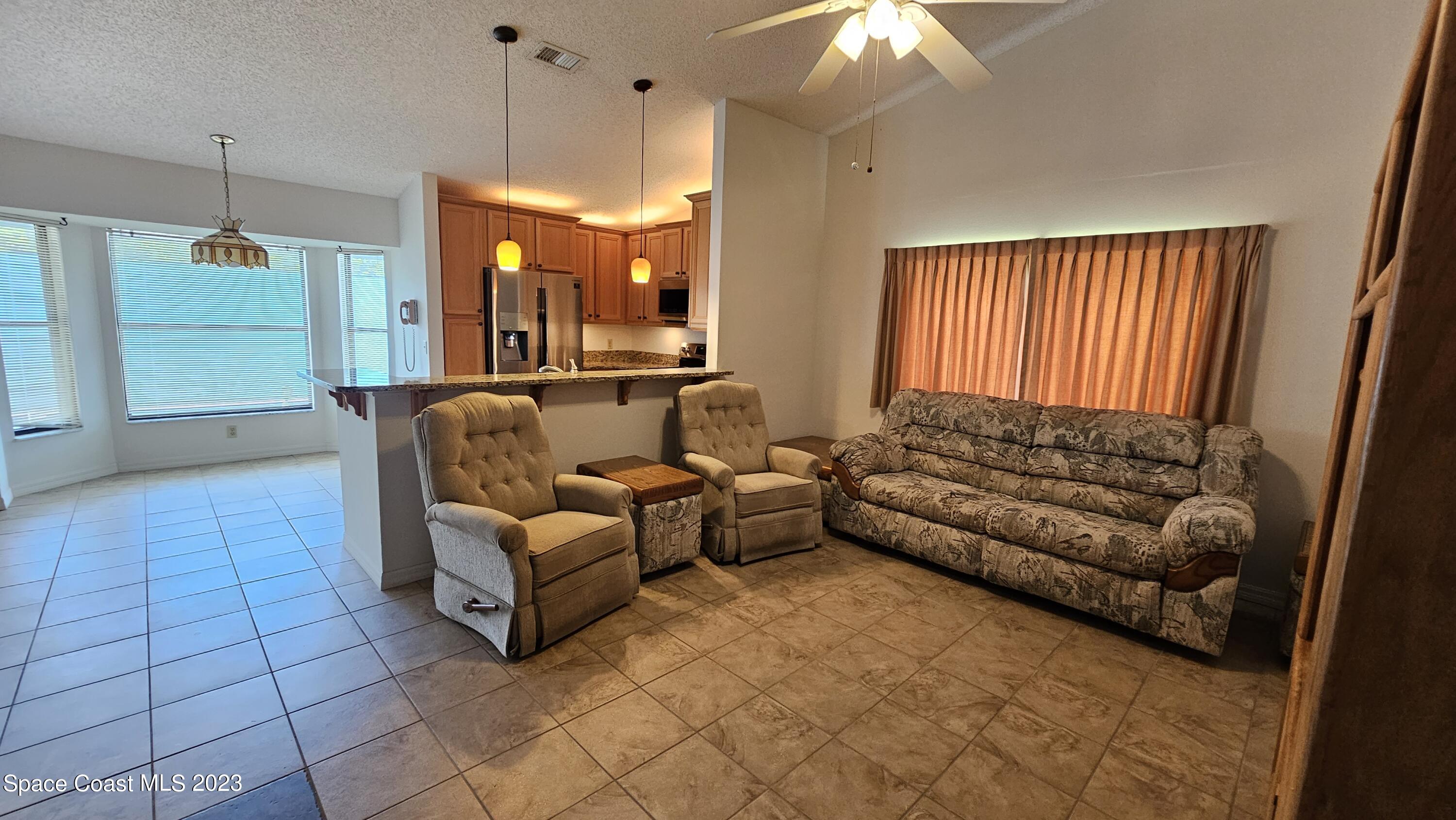 329 Pine Ridge Lane Melbourne, FL 32940 - Photo 8 of 30 20230809_123706