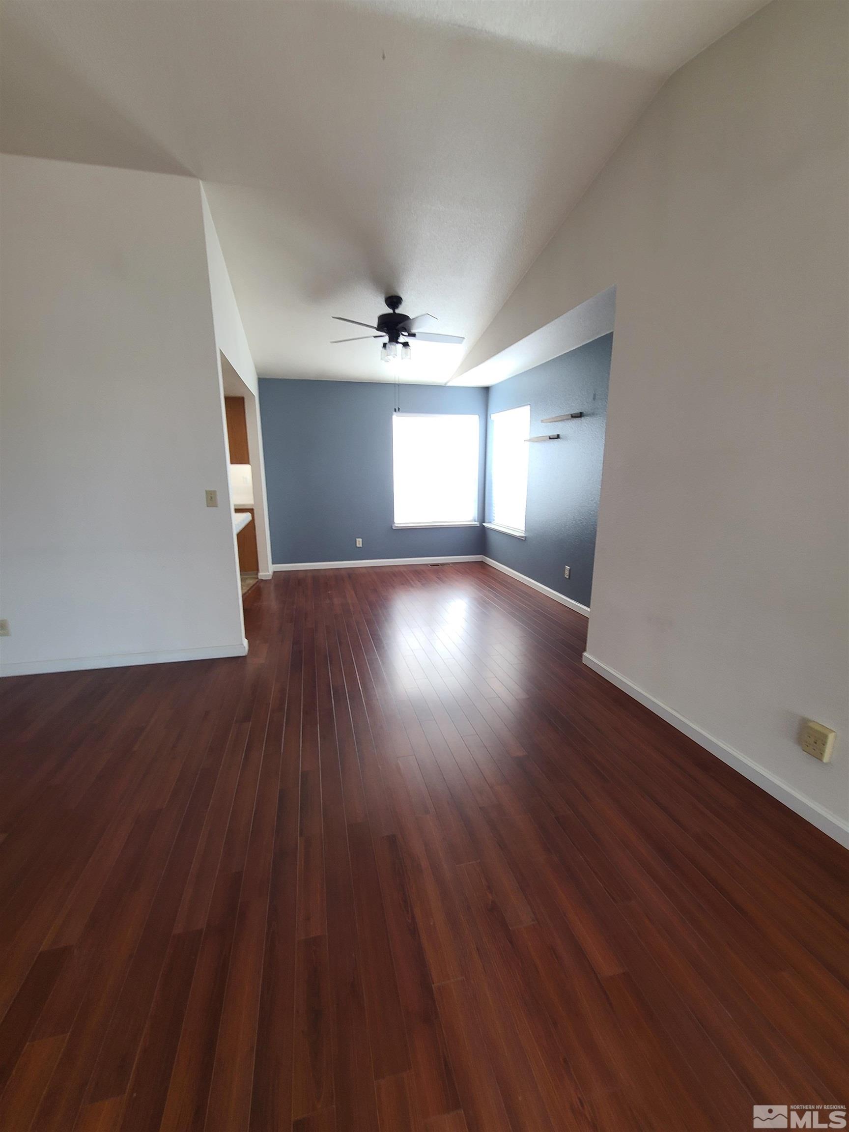 2760 Dallas Drive Fallon, NV 89406 - Photo 8 of 33 a view of wooden floor and windows in a room