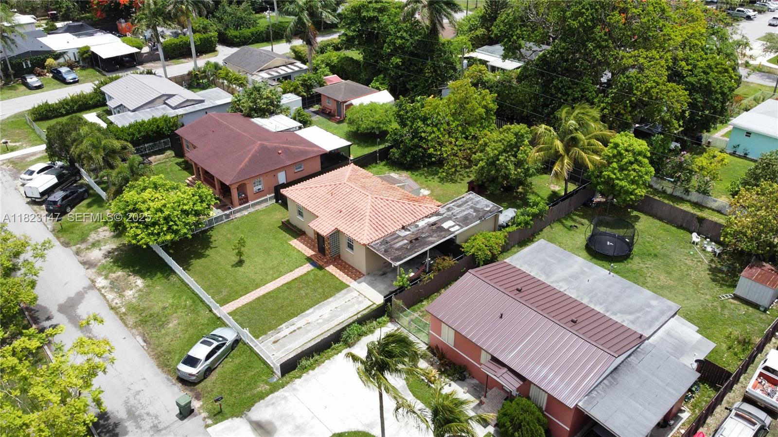 926 Northwest 3rd Avenue Homestead, FL 33030 - Photo 17 of 23 an aerial view of a house with a garden