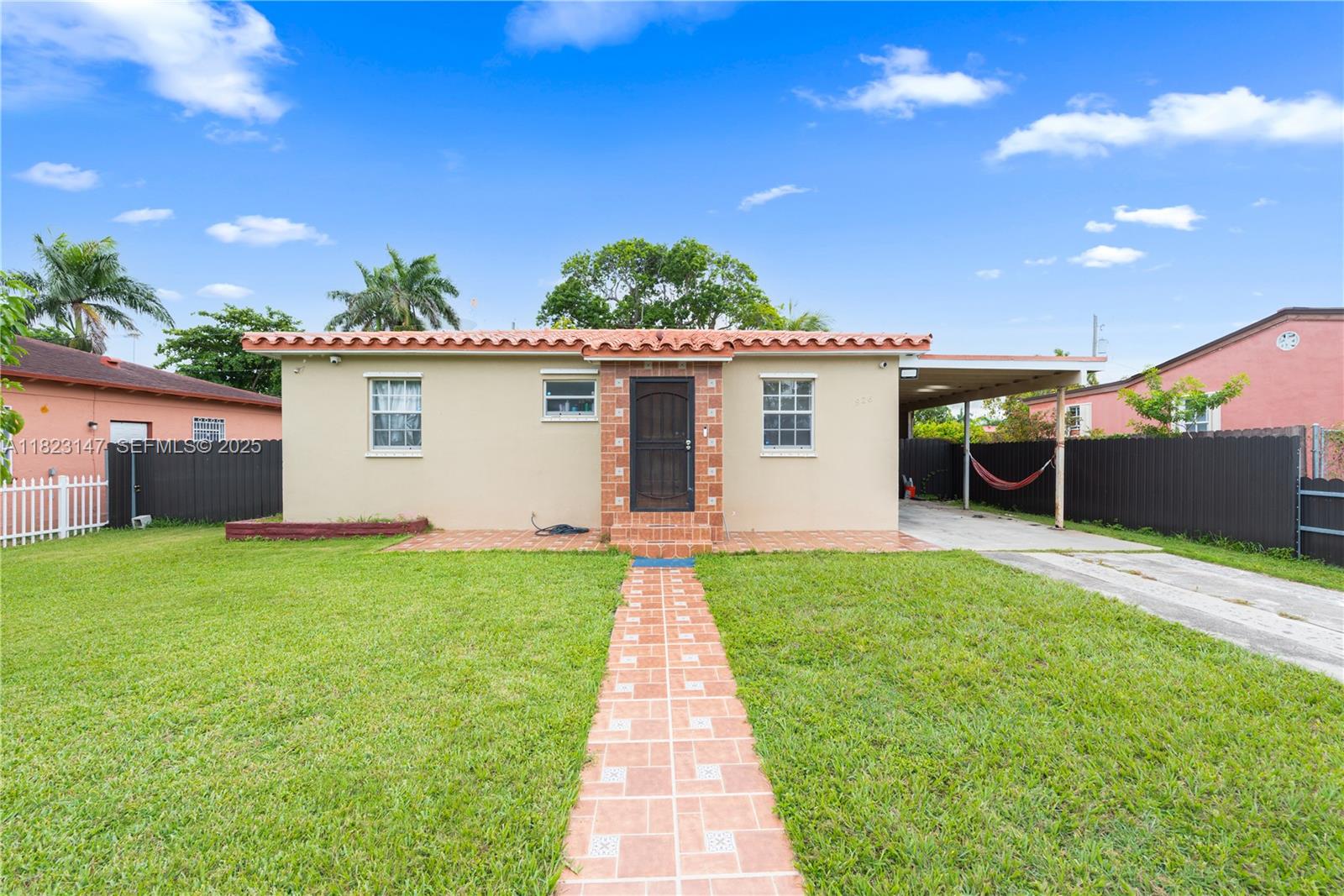 926 Northwest 3rd Avenue Homestead, FL 33030 - Photo 2 of 23 a view of a house with a patio