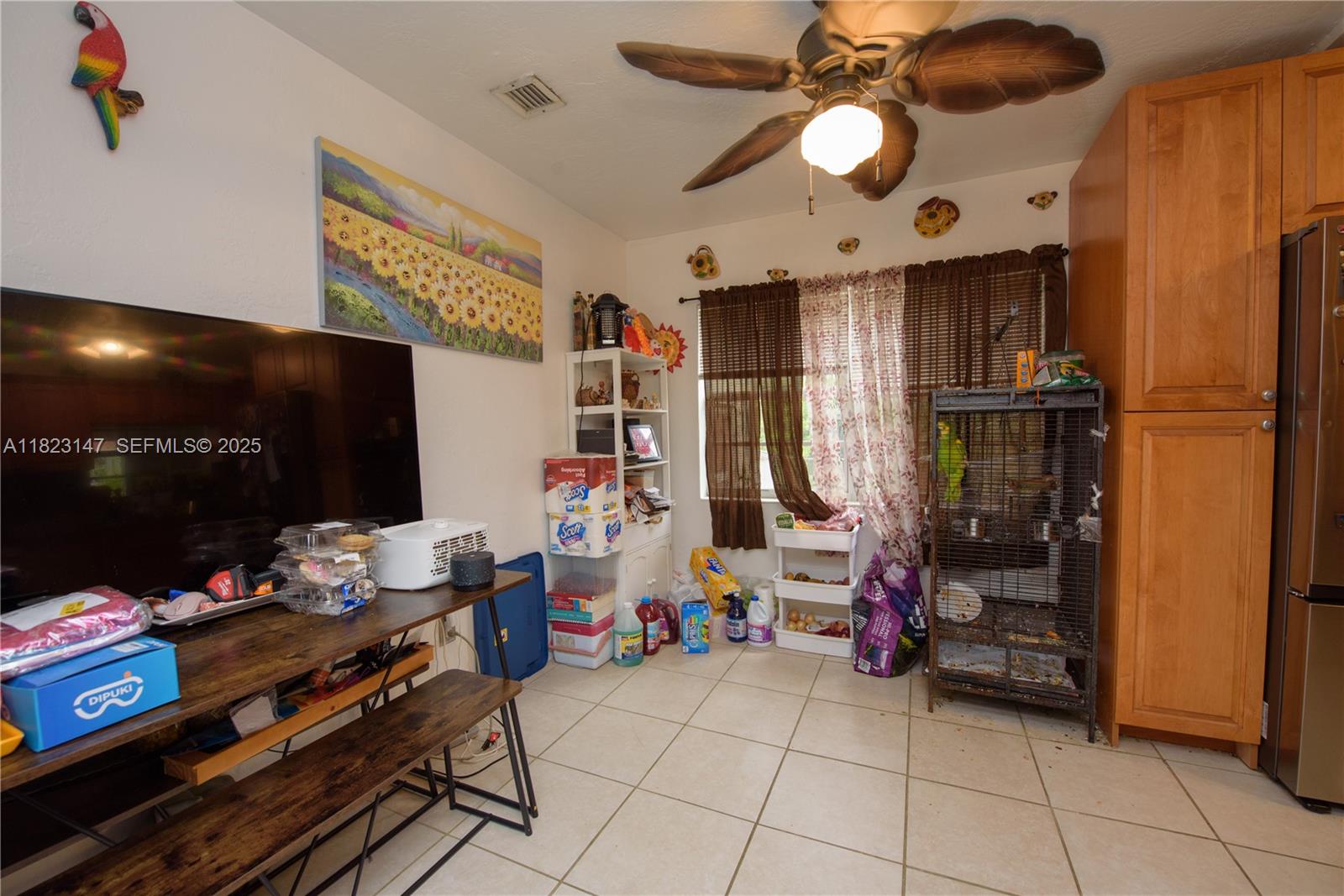 926 Northwest 3rd Avenue Homestead, FL 33030 - Photo 8 of 23 a very nice looking room with many windows and furniture