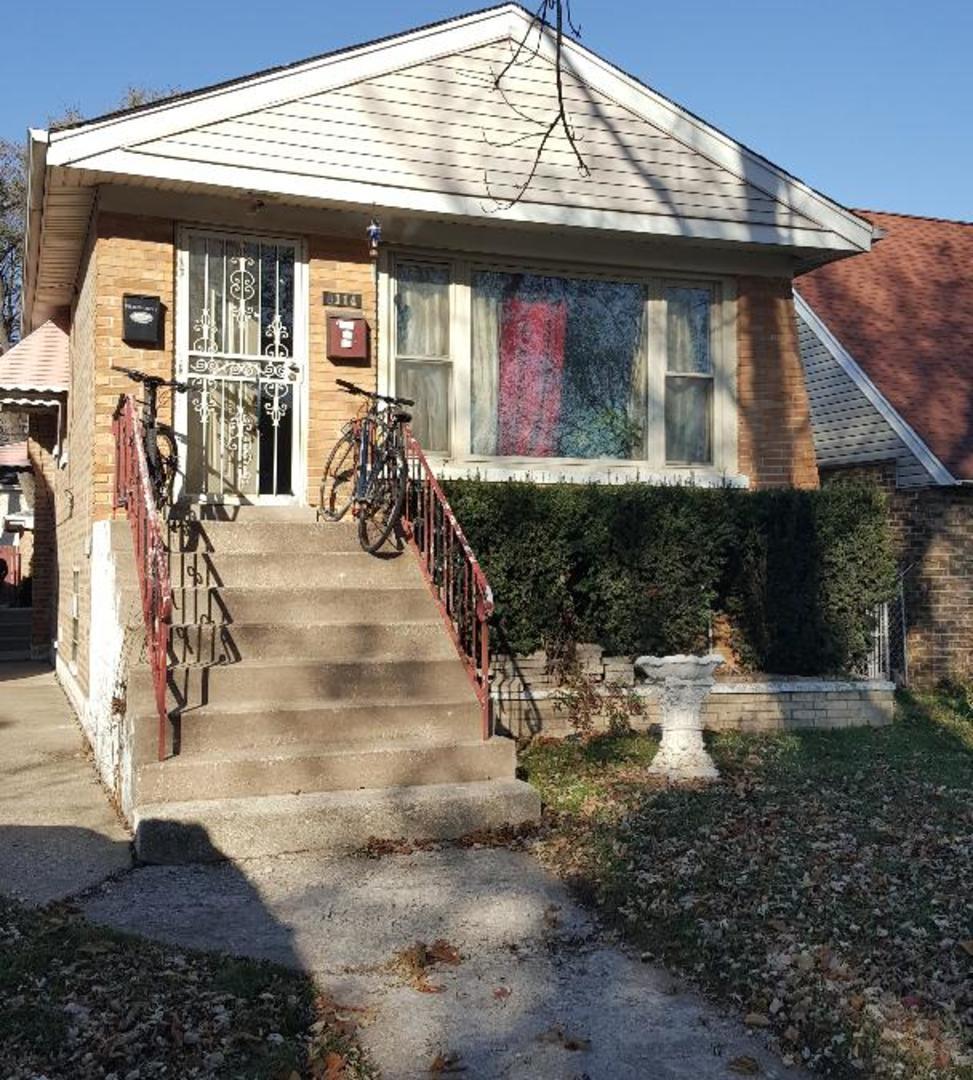 a view of a house with large windows