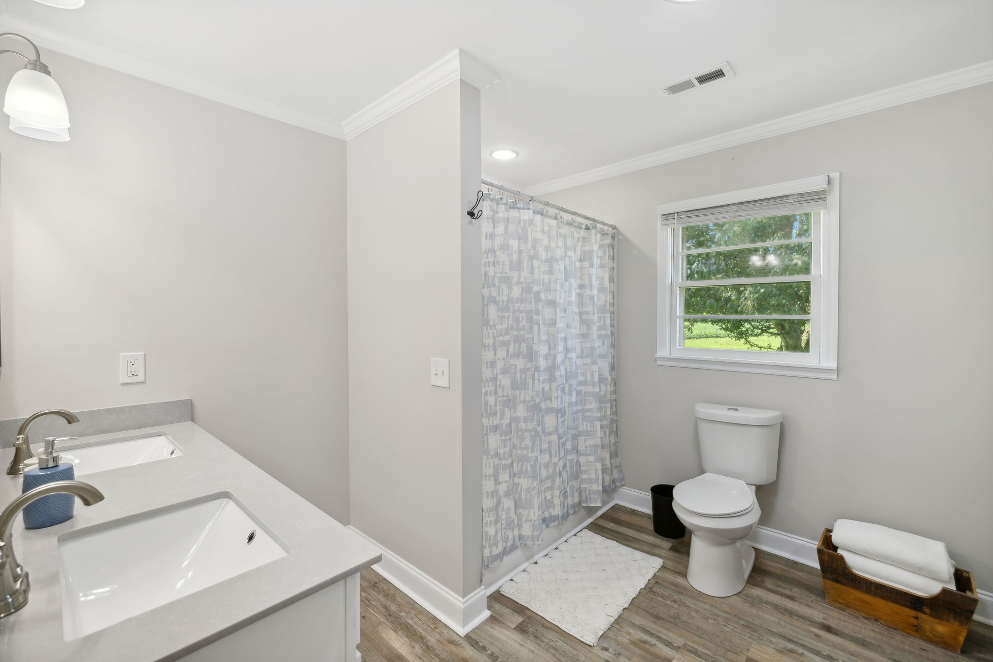 40 Yates Road Hillsboro, TN 37342 - Photo 18 of 39 a bathroom with a toilet a sink and a window