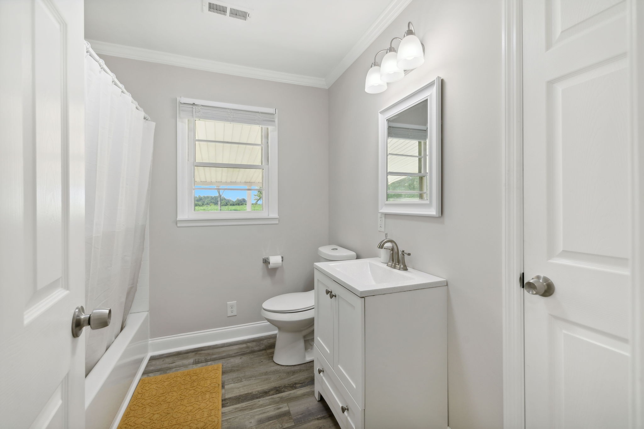 40 Yates Road Hillsboro, TN 37342 - Photo 23 of 39 a bathroom with a sink toilet and mirror