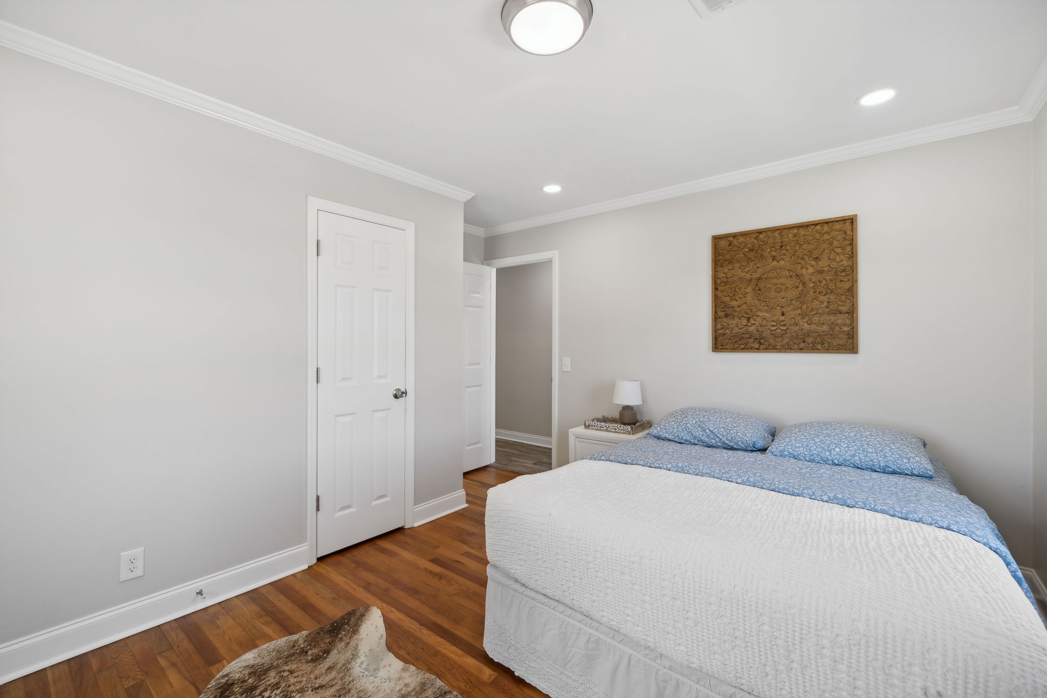 40 Yates Road Hillsboro, TN 37342 - Photo 25 of 39 a bedroom with a bed and a painting on the wall