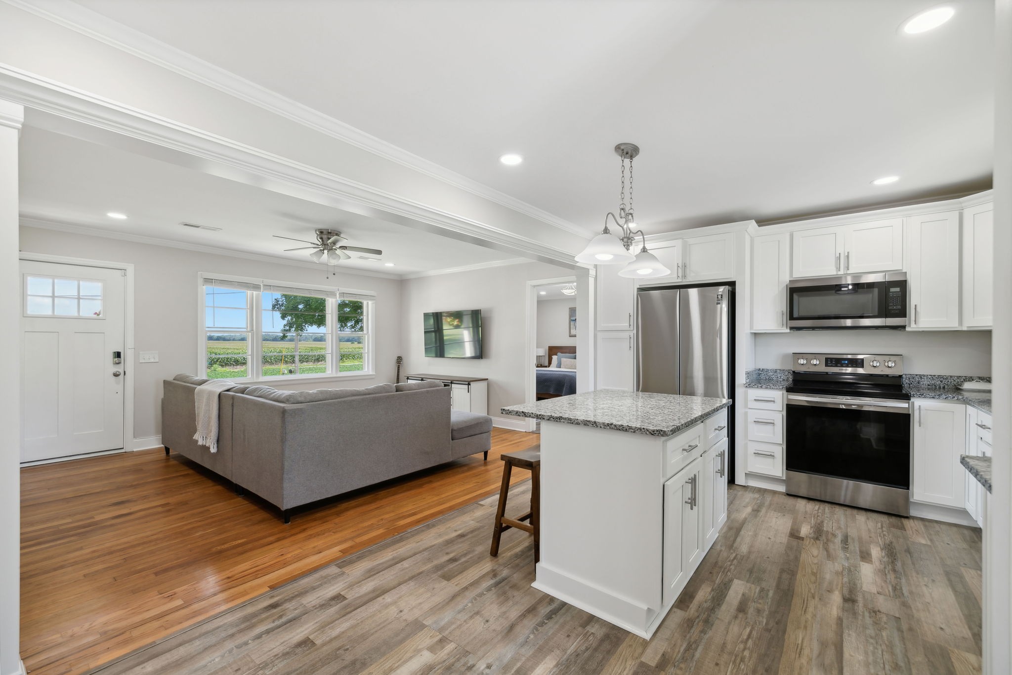 40 Yates Road Hillsboro, TN 37342 - Photo 10 of 39 a kitchen with stainless steel appliances granite countertop a stove oven and a refrigerator
