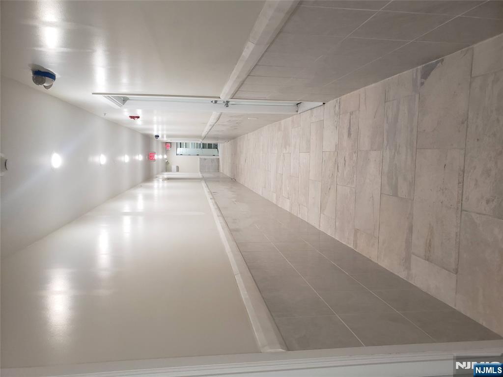 44 Bergen Boulevard, Unit 9 Fairview, NJ 07022 - Photo 4 of 16 a view of gallery with hallway