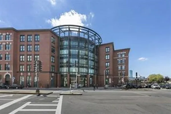 a view of a building with a street