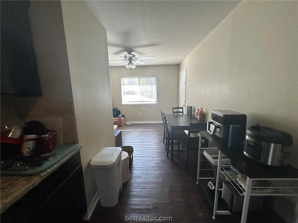 305 Ehlinger Drive, Unit D Bryan, TX 77801 - Photo 5 of 11 a view of a dining room with furniture and window