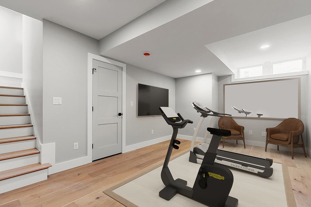 308 Newton Street, Unit 1F Waltham, MA 02453 - Photo 25 of 37 a view of a room with gym equipment