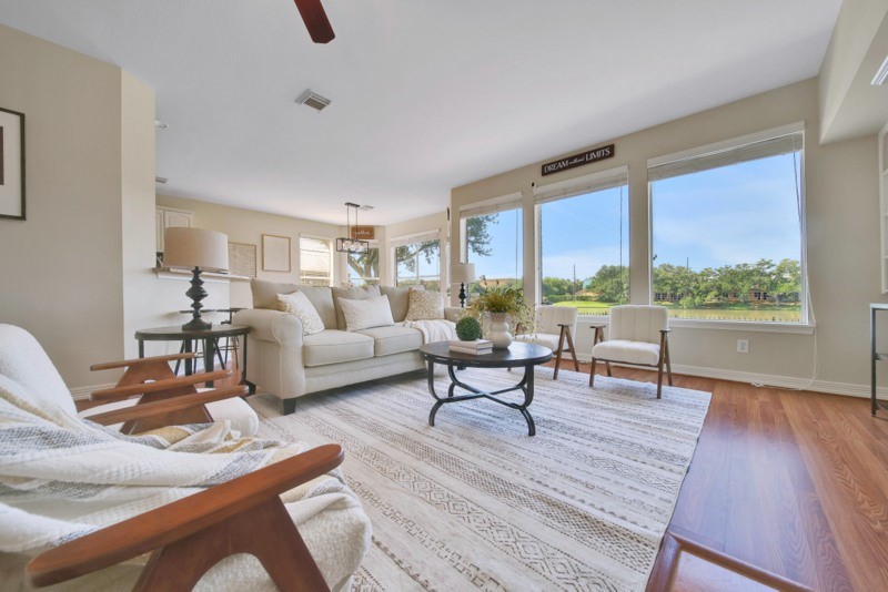 3206 Summer Bay Drive Sugar Land, TX 77478 - Photo 12 of 43 a living room with furniture and a wooden floor