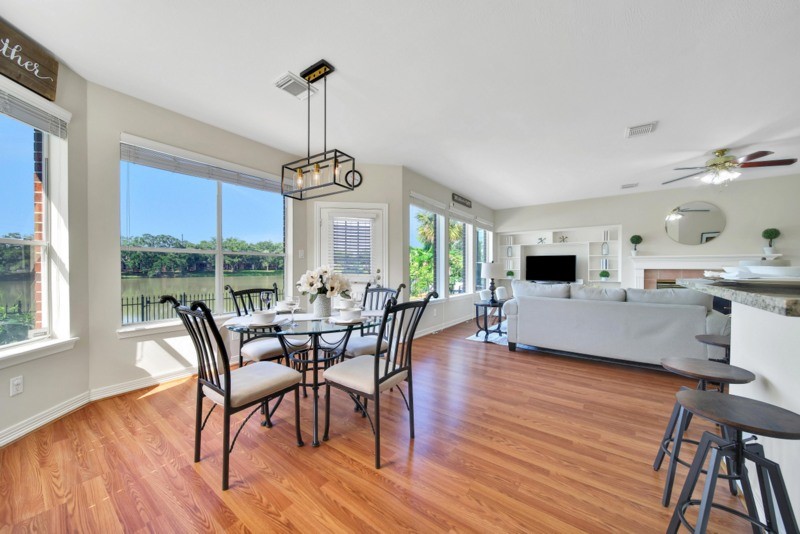 3206 Summer Bay Drive Sugar Land, TX 77478 - Photo 17 of 43 a view of a dining room with furniture window and wooden floor
