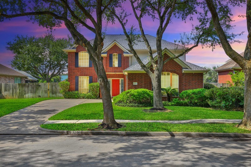 3206 Summer Bay Drive Sugar Land, TX 77478 - Photo 2 of 43 a front view of a house with a yard