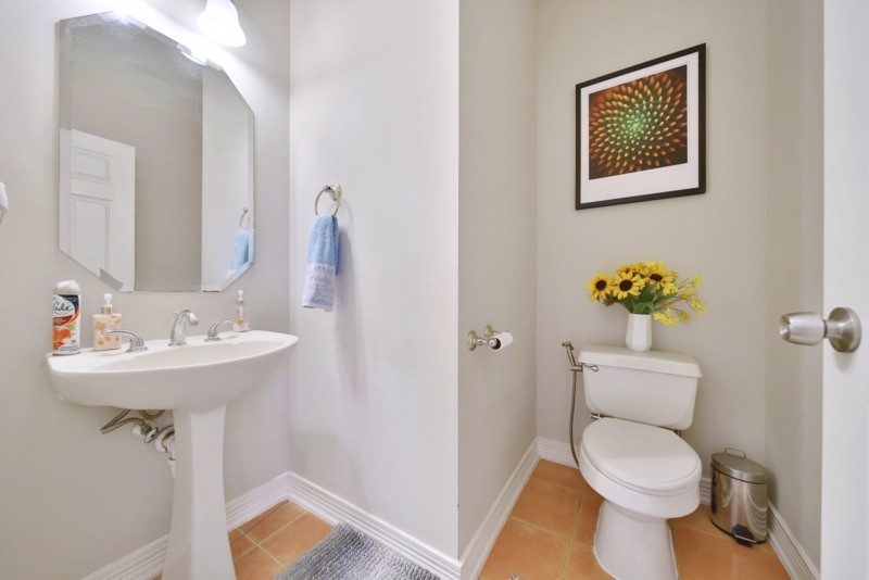 3206 Summer Bay Drive Sugar Land, TX 77478 - Photo 21 of 43 a bathroom with a toilet sink and mirror