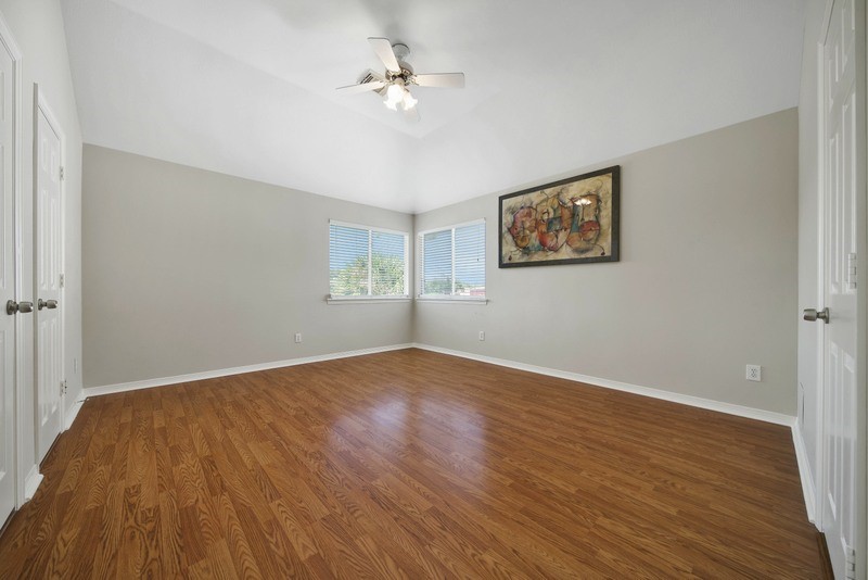 3206 Summer Bay Drive Sugar Land, TX 77478 - Photo 36 of 43 wooden floor in an empty room with a window