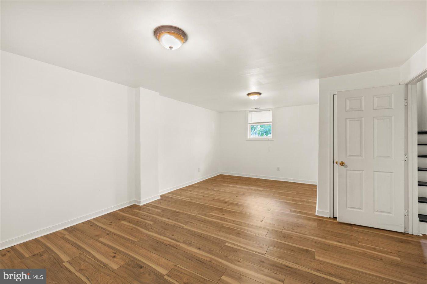 975 Swan Lane Ruther Glen, VA 22546 - Photo 24 of 42 a view of empty room with wooden floor
