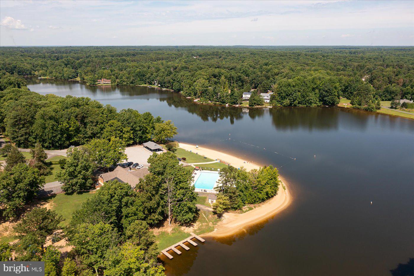 975 Swan Lane Ruther Glen, VA 22546 - Photo 35 of 42 an aerial view of ocean and residential houses with outdoor space