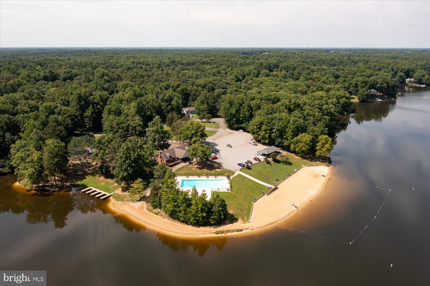 975 Swan Lane Ruther Glen, VA 22546 - Photo 36 of 42 an aerial view of a house with a yard and lake view