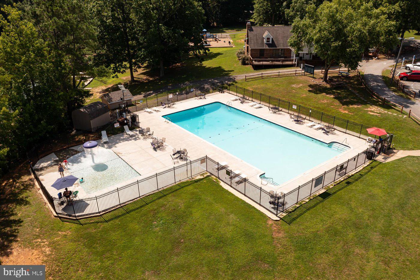975 Swan Lane Ruther Glen, VA 22546 - Photo 40 of 42 a view of a house with swimming pool