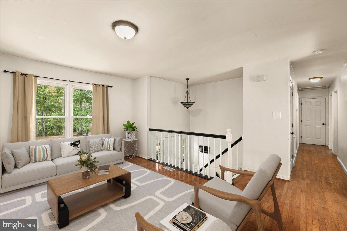 975 Swan Lane Ruther Glen, VA 22546 - Photo 6 of 42 a living room with furniture and a window