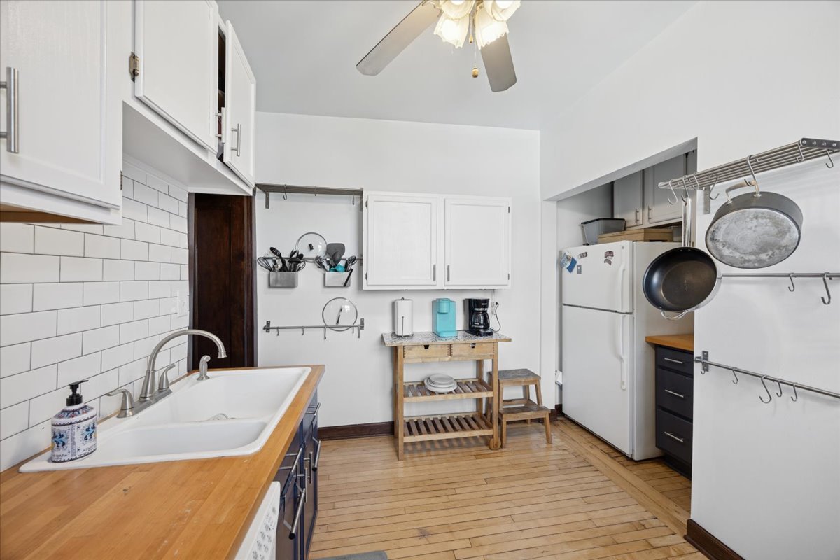 642 Van Buren Street, Unit 2 Oak Park, IL 60304 - Photo 13 of 23 a bathroom with a sink and a washer dryer