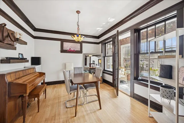 a view of a livingroom with furniture and a window
