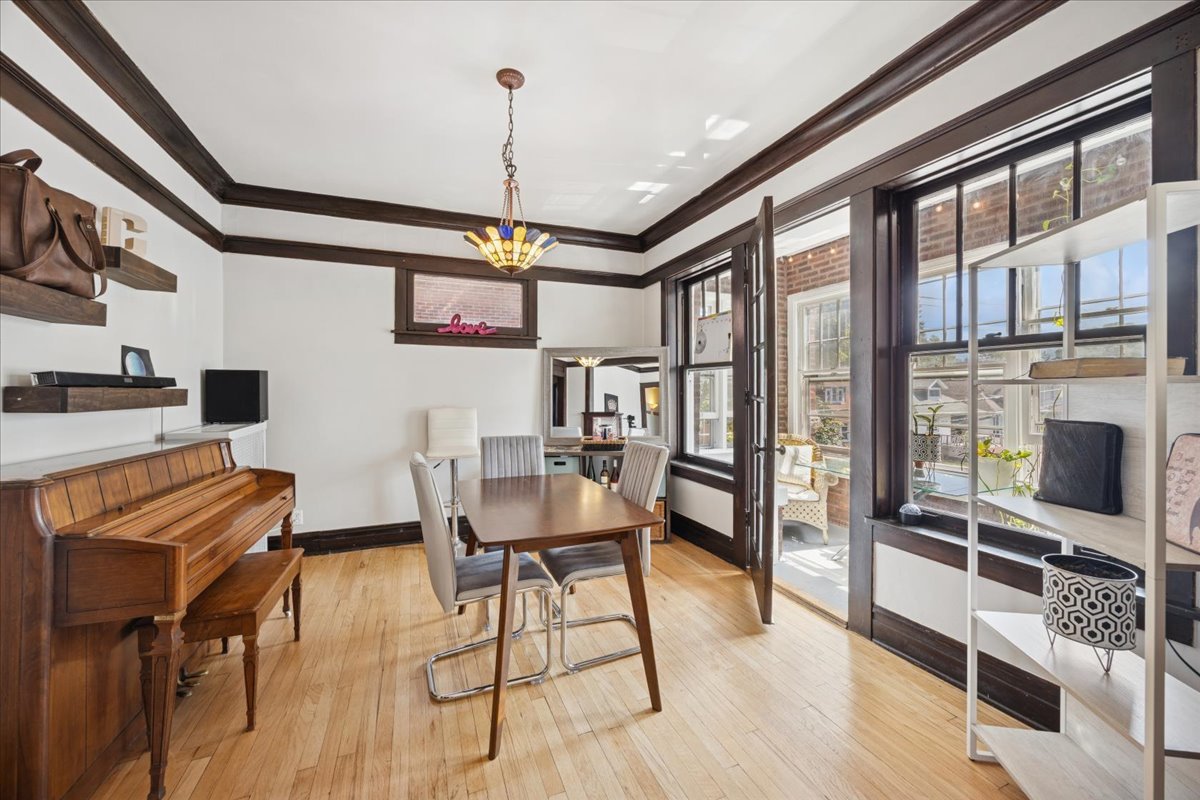642 Van Buren Street, Unit 2 Oak Park, IL 60304 - Photo 17 of 23 a view of a livingroom with furniture and a window