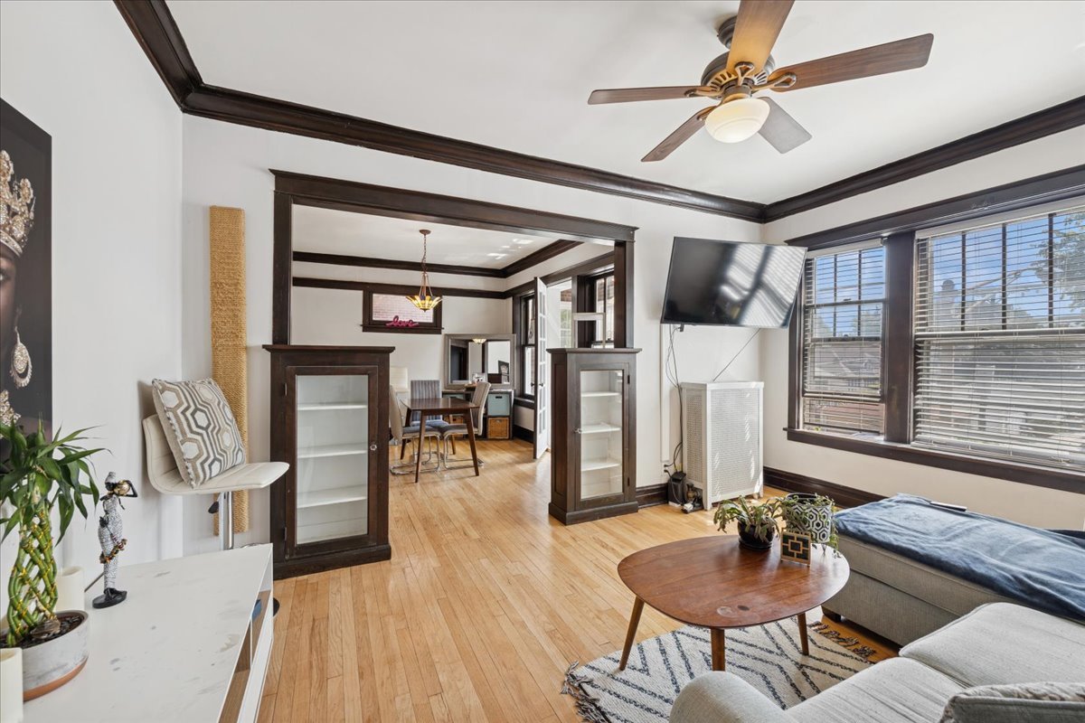 642 Van Buren Street, Unit 2 Oak Park, IL 60304 - Photo 7 of 23 a living room with furniture and a large window