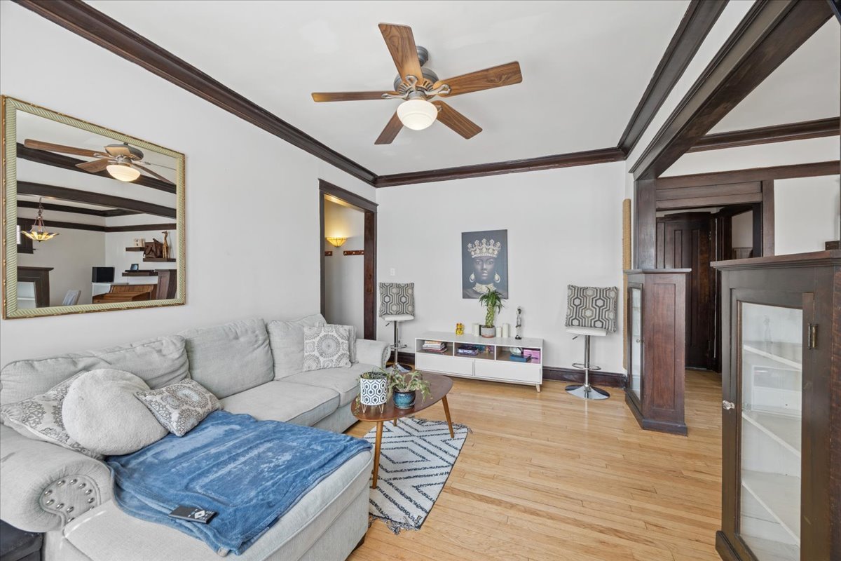 642 Van Buren Street, Unit 2 Oak Park, IL 60304 - Photo 9 of 23 a living room with furniture and a wooden floor