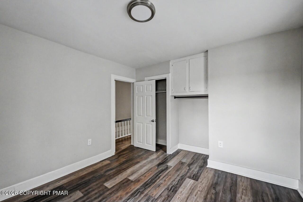432 Edwards Court Scranton, PA 18504 - Photo 24 of 34 a view of empty room with wooden floor
