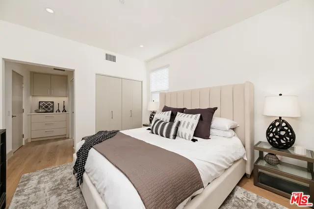 a bathroom with a toilet sink and shower