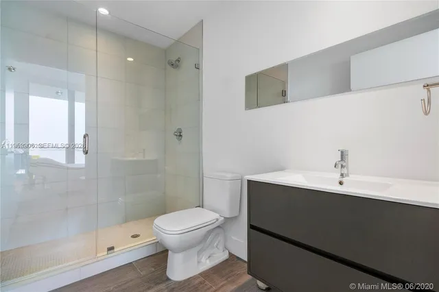 a en suite bathroom with a sink and a toilet