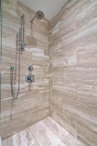 a bathroom with a sink a mirror and a toilet