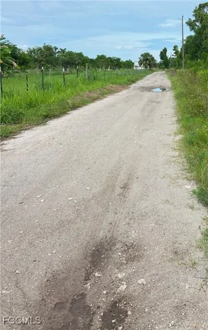a view of a road with an outdoor space