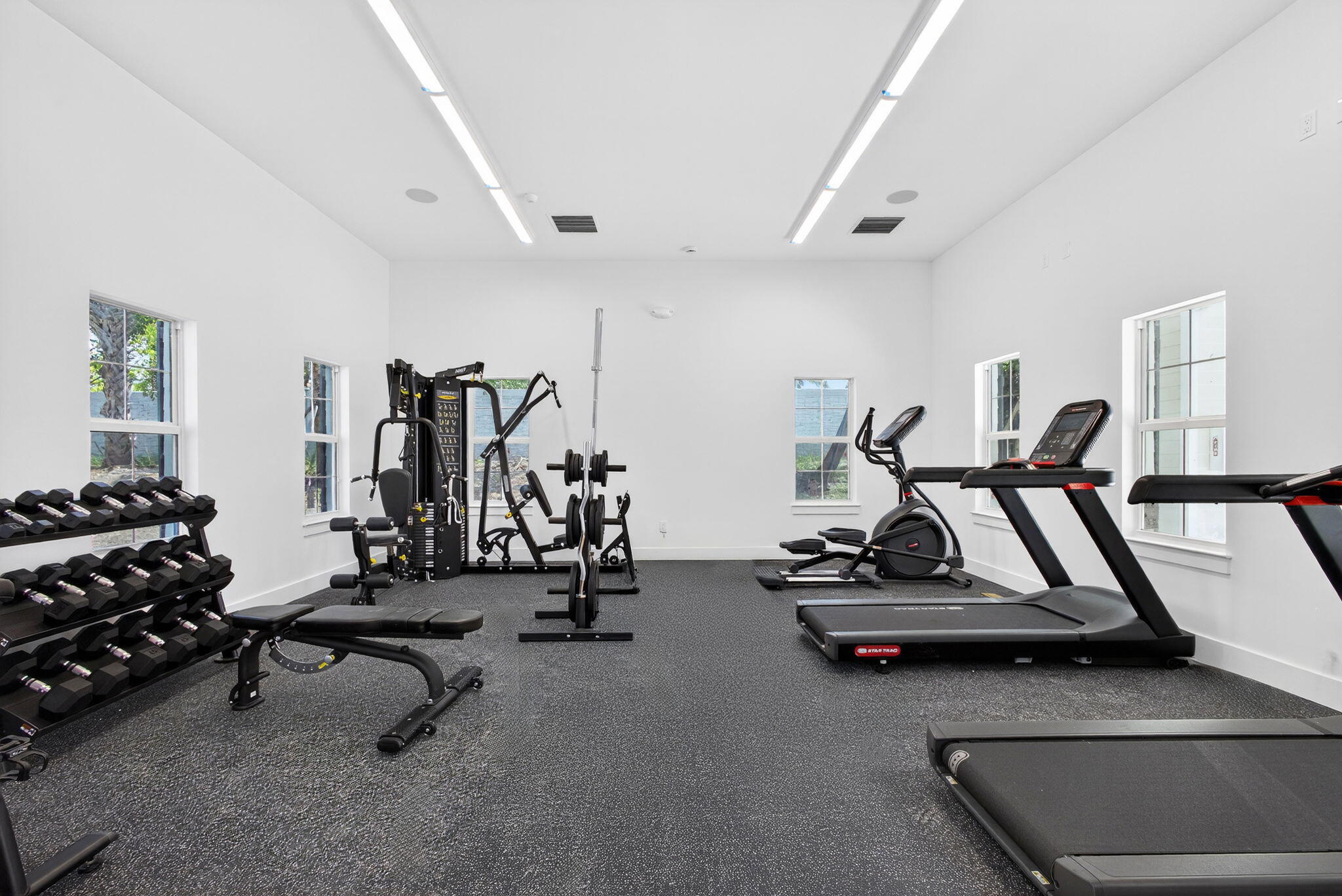 125 Water Pointe Place, Unit 28 Jupiter, FL 33477 - Photo 11 of 19 a view of a room with gym equipment
